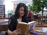 Teenage girl reading book